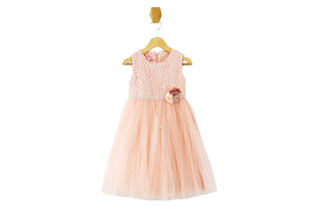 Pink tulle dress on hanger