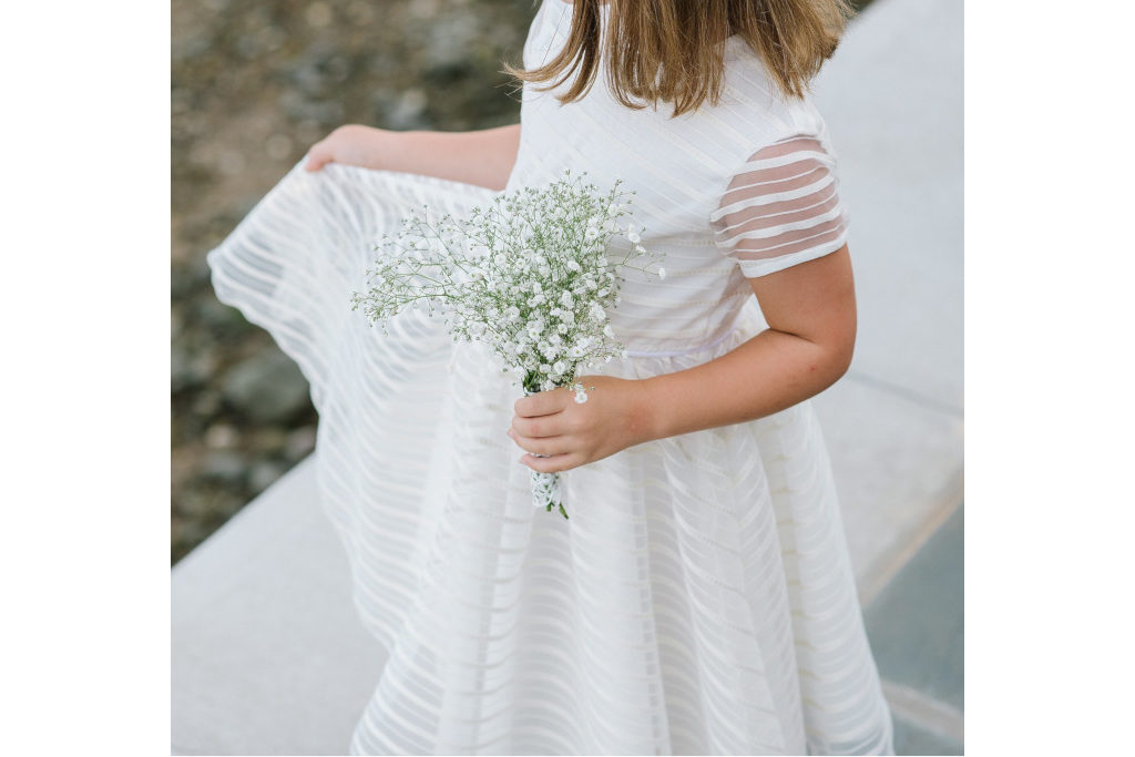 Girl in white striped dress