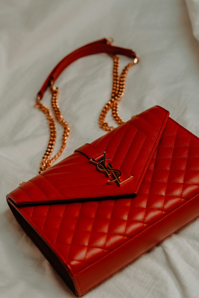 Red YSL bag | Vinted Luxury Trends Report 2024
