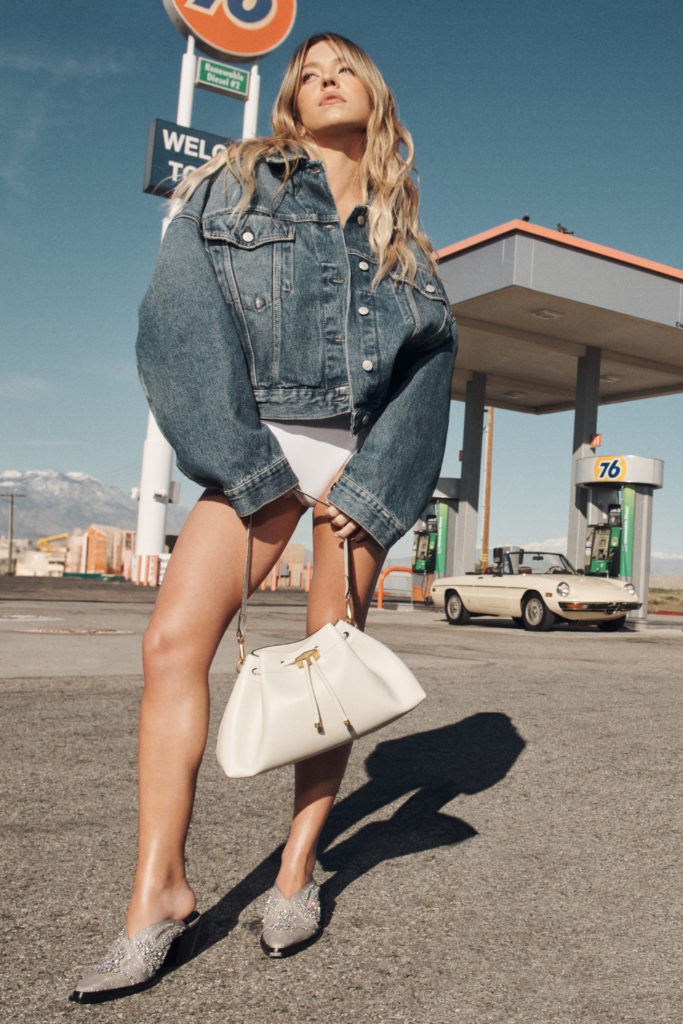 Sydney Sweeney in front of gas station