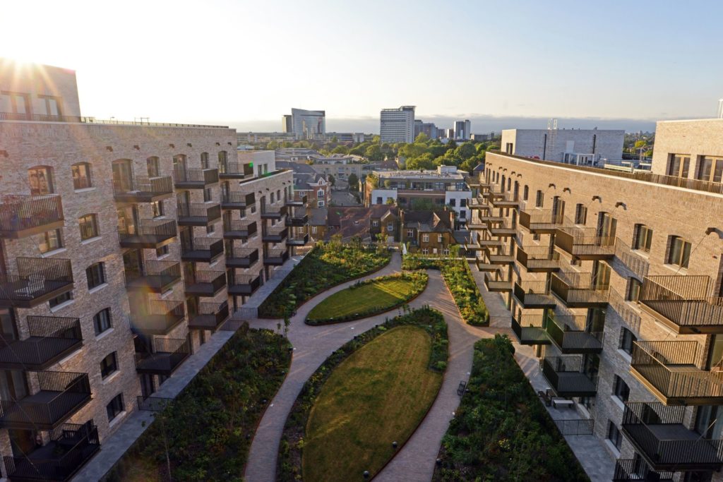 Aerial view of Brentford apartments with raised podium gardens