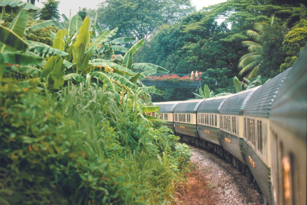 Eastern & Oriental Express travelling across a leady hillside