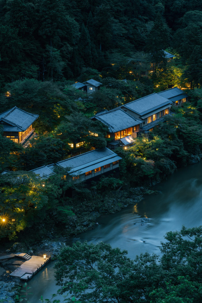 HOSHINOYA Kyoto on the riverbank at dusk