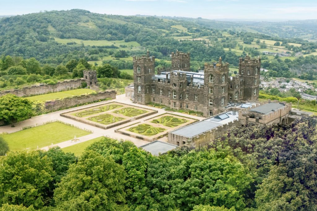 Aerial view of Riber Castle with formal gardens