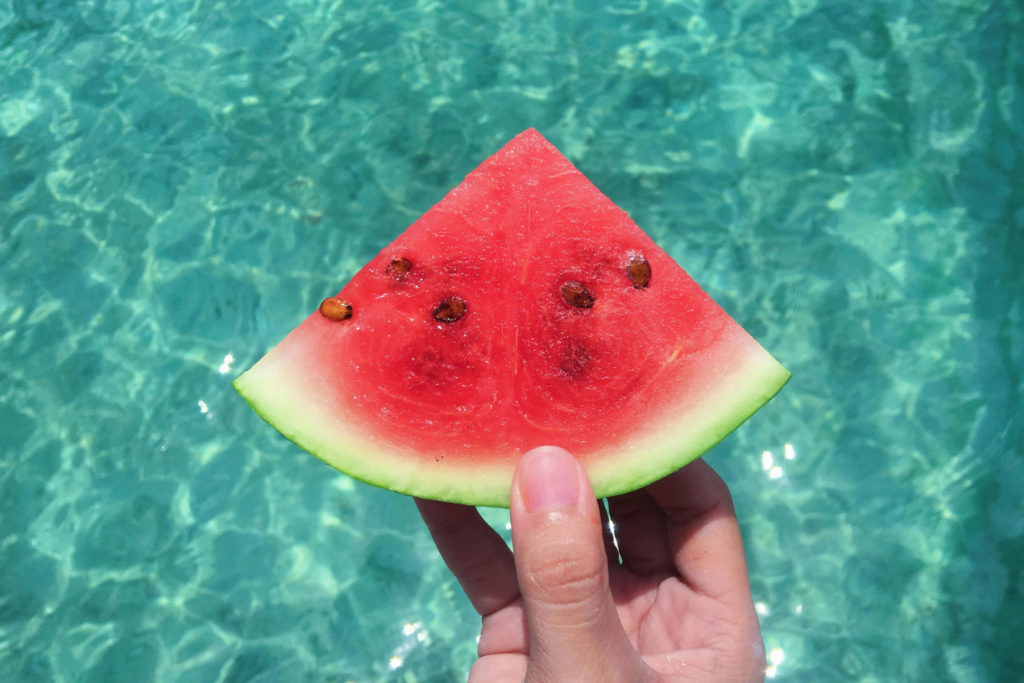 Watermelon by a pool