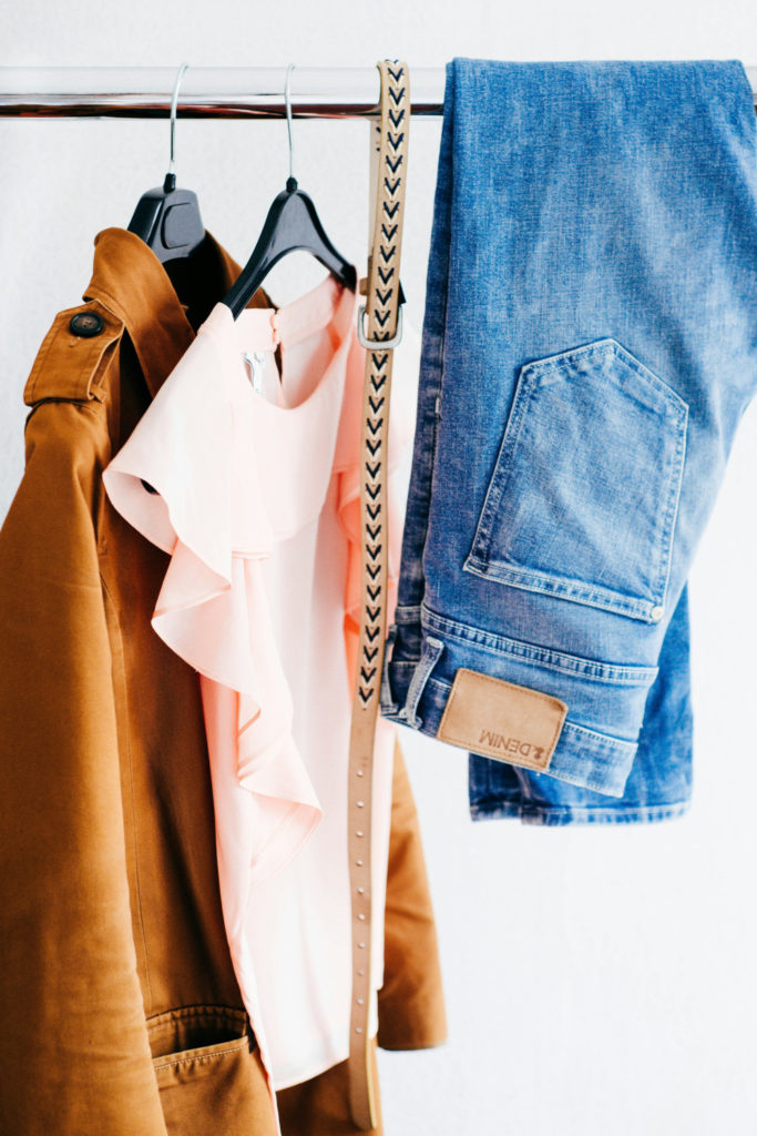 Clothes hanging on rail