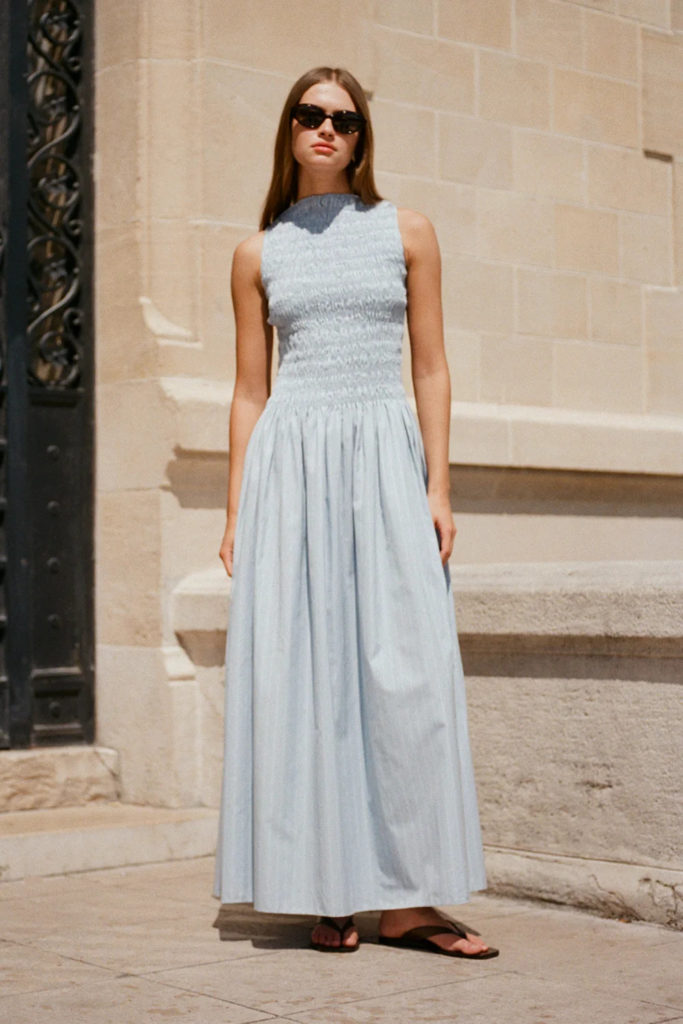 Woman in blue summer dress