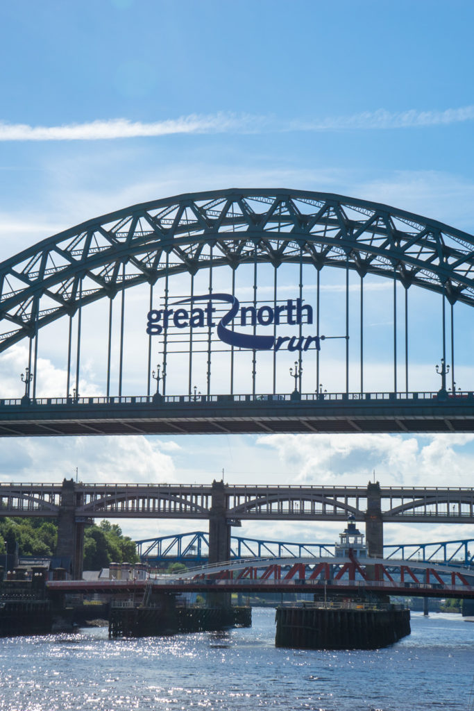 Tyne Bridge, Newcastle Upon Tyne, with Great North Run sign on it.