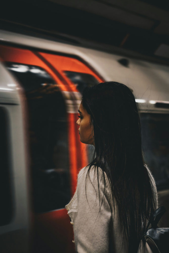 Woman waiting by tube | London skin health