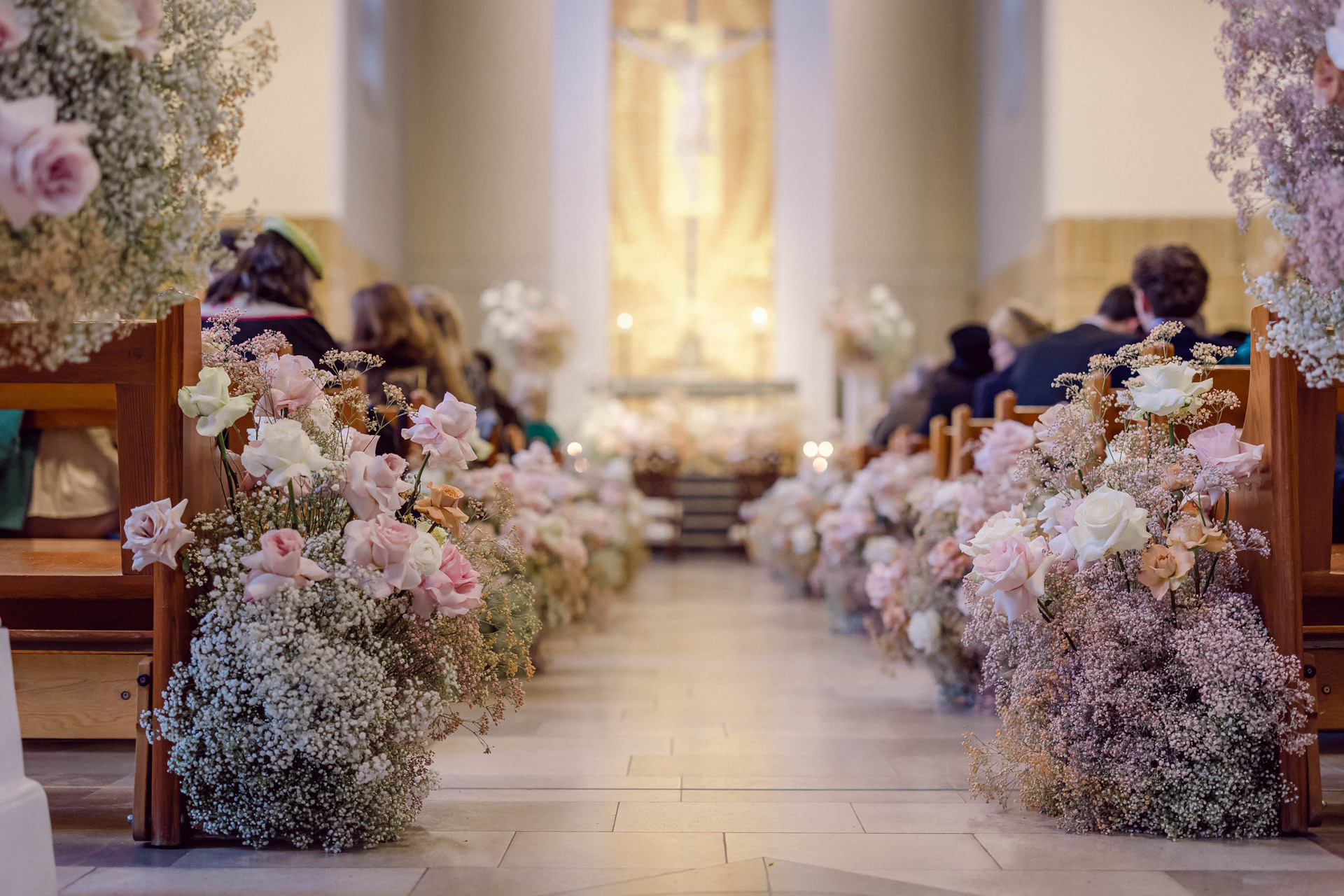 A wedding aisle with flowers