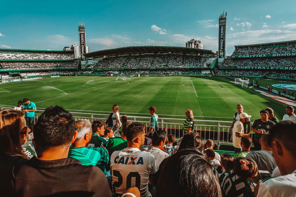 People watching football at a stadium