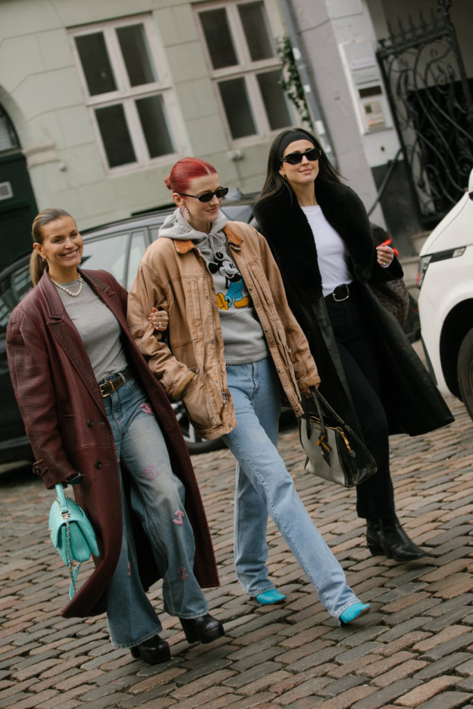 Woman with great hair walking around Copenhagen Fashion Week AW24