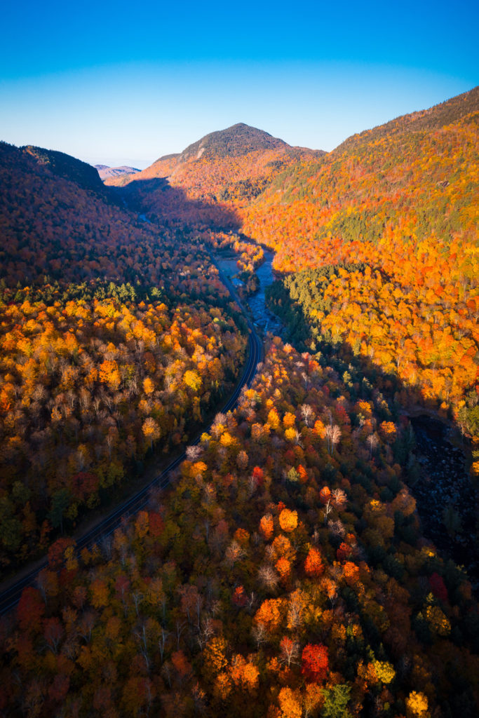 Aerial view of Mountain Forests with Brilliant Fall Colors in Autumn, Adirondacks, New York, New England