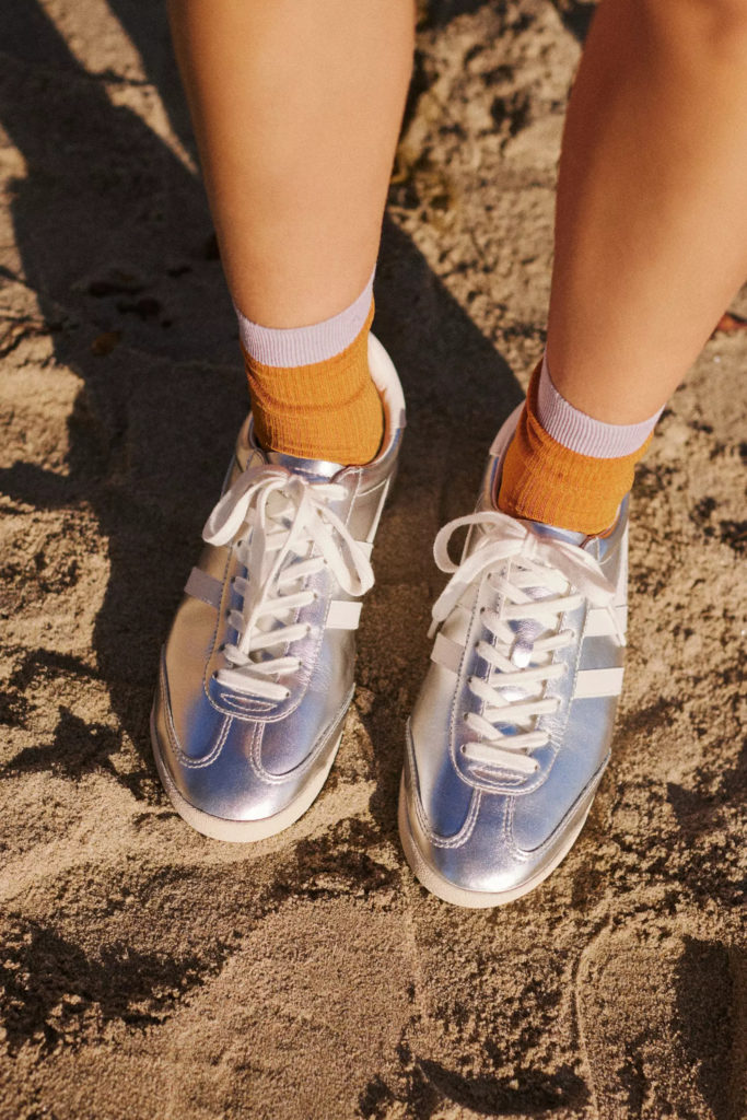 Close up of feet in silver trainers