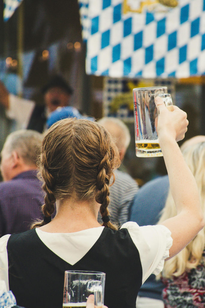 A woman with a beer at Oktoberfest