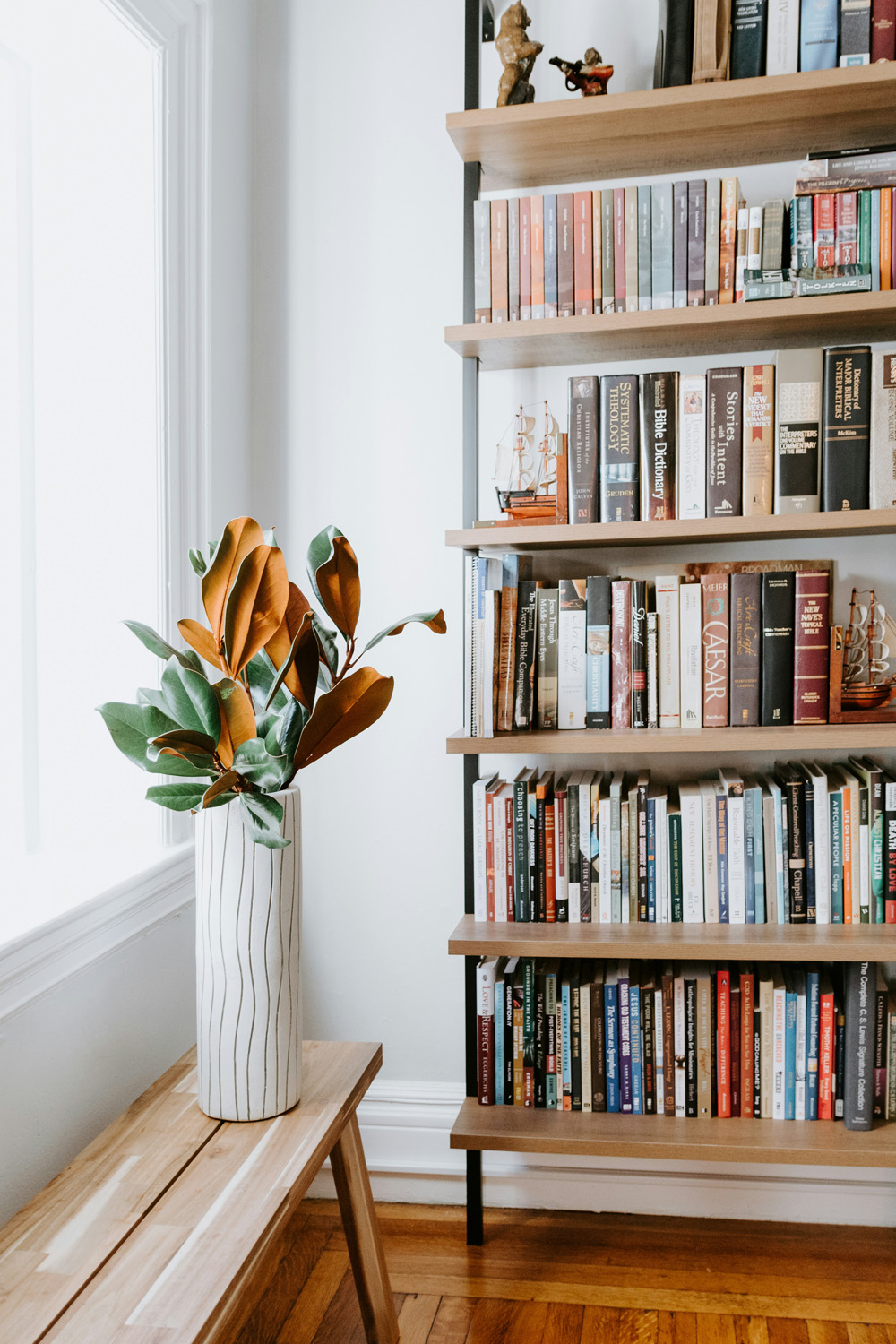 How To Curate The Perfect Bookshelf, According To 6 Book Influencers